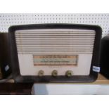 A vintage Bakelite cased radio and a wooden cased example