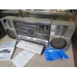A 1980s Sharp 990 ghetto blaster with detachable speakers and integrated music processor