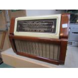 A walnut cased Regentone radio with fold down front to reveal turntable
