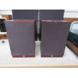 A pair of Wharfedale 504 bookshelf speakers