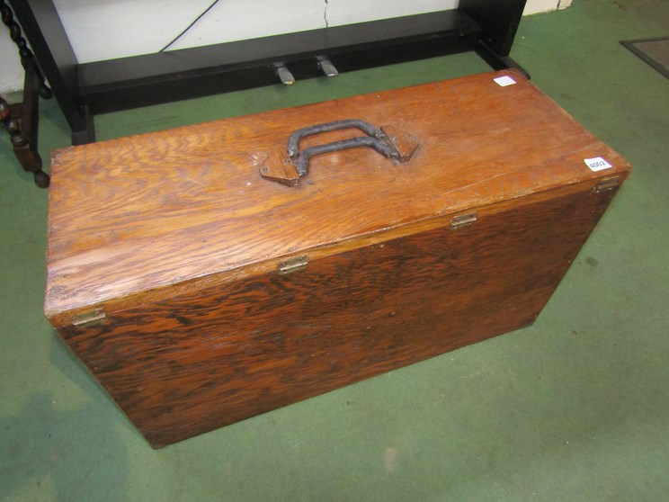 An oak cased folding portable organ