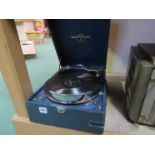 A vintage Columbia wind up gramaphone with disc holding platter