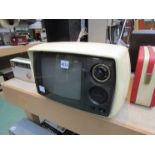 A vintage Sanyo colour television in cream casing