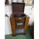 An Ultra walnut cased radiogram with Bakelite knobs