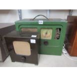 A vintage green cased radio and a W.E.