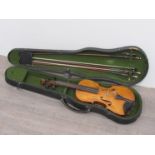 An early 20th Century half size (1/2) violin with spruce top,