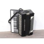 A Bandmaster Weltmeister 120 bass piano accordion in black and metallic,