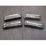 Four Seydel harmonicas consisting of LLF, LF,