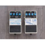 Two Boss electric guitar stomp pedals: Digital Delay DD-3 and DD7