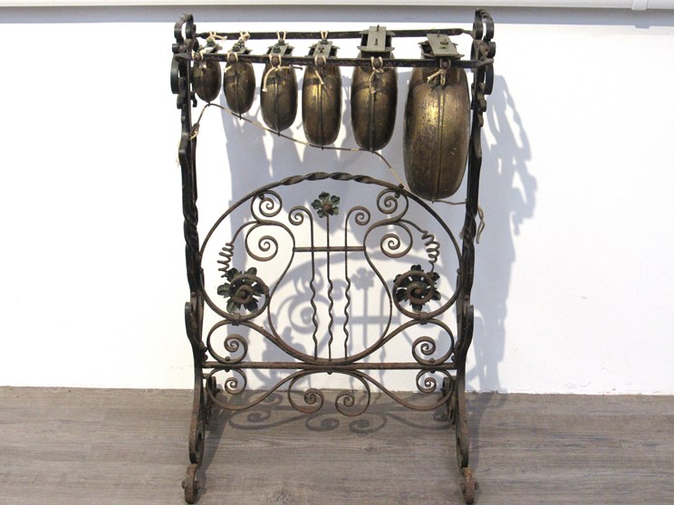 A 19th Century glockenspiel style instrument with metal keys over bells,