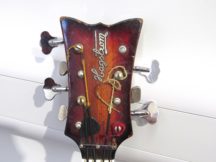 A late 1960's Hagstrom H8 8 string electric bass guitar, twin shoulder body with sunburst paintwork, - Image 2 of 3