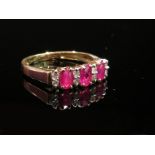 A 9ct gold ruby and diamond ring, size M, 1.