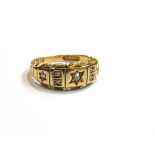 An 18ct gold diamond set ring in rub-over setting, size L, 2.