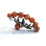 A Victorian silver bird brooch set with coral stones and seed pearls and a coral droplet, 8.