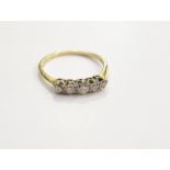 A gold five stone graduated diamond ring, size O, 1.