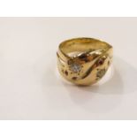 A Victorian 18ct gold double headed snake ring, the snake heads set with diamond and ruby red eyes,