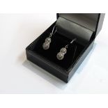 A pair of white gold double drop diamond earrings, 11mm drop, 3.
