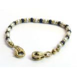 An 18ct gold pearl and Lapis Lazuli bead bracelet,