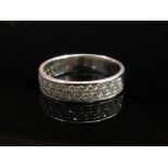 An 18ct white gold diamond double row half hoop ring, size Q, 5.