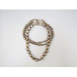 Triple row of frosted silver tone pebble bead necklace by Kate Hines,