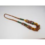 1960's graduated necklace of interlocking teak wood links and plastic yellow and green beads