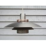 A Danish four tiered ceiling light in grey and copper coloured finish