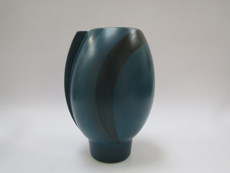 A KMK modernist ceramic cut avoid vase with pedestal base,