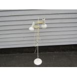 A white finish standard lamp with arm adjustable spots