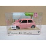 A Marks & Spencer pink radio controlled Mini Cooper,