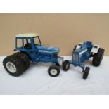 Two diecast Ford tractors