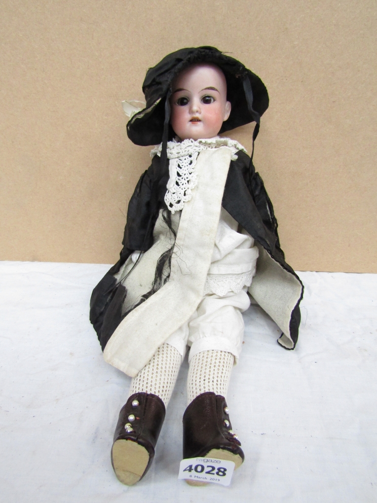 An Armand Marseille bisque headed doll,