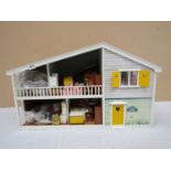A boxed Burton Toys "Carolines Home" dolls house and a quantity of packaged and loose "Carolines