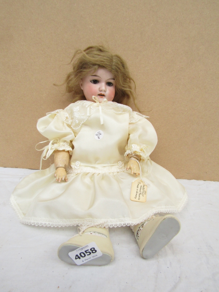 A bisque headed and composition body jointed doll, Armand Marseille,