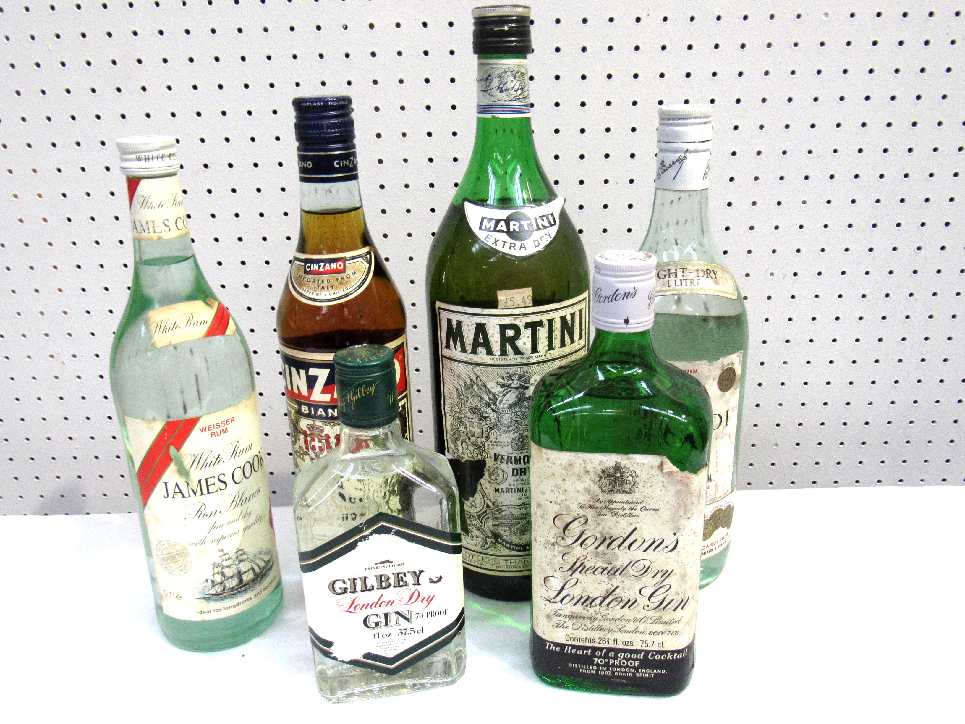 Martini Vermouth 1.5ltr, Cinzano Bianco 75cl, James Cook White Rum .71e, Gilbey's Gin 37.