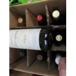 Eleven various bottles of red and white wine including 1996 Chateau Les Charmettes,