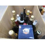 A box of various Sparkling wines and spirits including Prosecco, Campari,