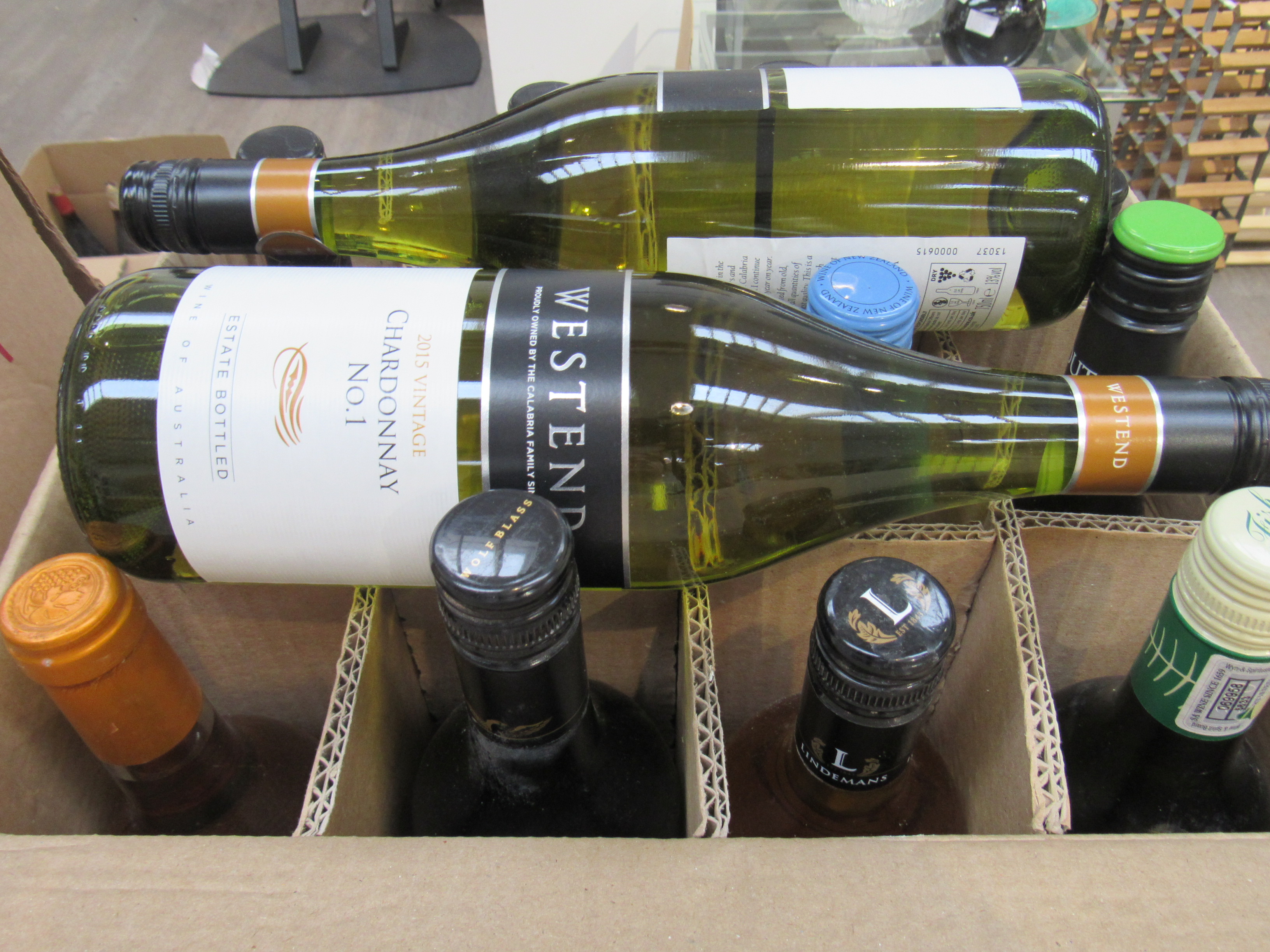 Fourteen various bottles of white wines including Chardonnay (14)