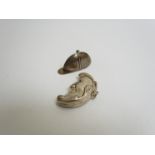 Two silver vesta cases in the form of a jockey hat and man in the moon, marked 925,