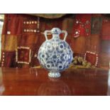 A Chinese Islamic influence blue and white moon flask