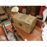 An 18th Century small domed trunk, lable inside for "Bailey Saddles, Preston",
