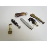 Six various vintage pipe tampers