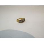 A yellow gold diamond ring, the three rows set with brilliant cut diamonds, size N, 6.