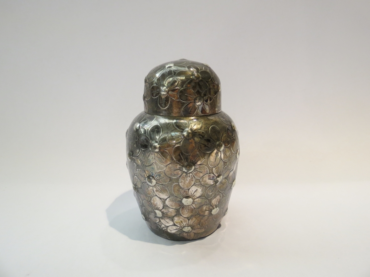 A Wilcox silver plated pot pourri canister in the form of a ginger jar with floral decoration