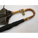 A 1920's Swaine and Adeney umbrella with terrier head handle and a gentleman's Swaine and Adeney