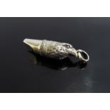 A silver whistle of eagle form, marked 925,