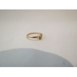 A 14ct gold wishbone ring set with diamonds, 1.