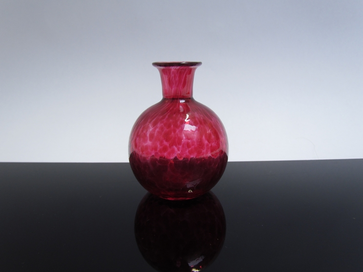 A miniature Loetz style vase,