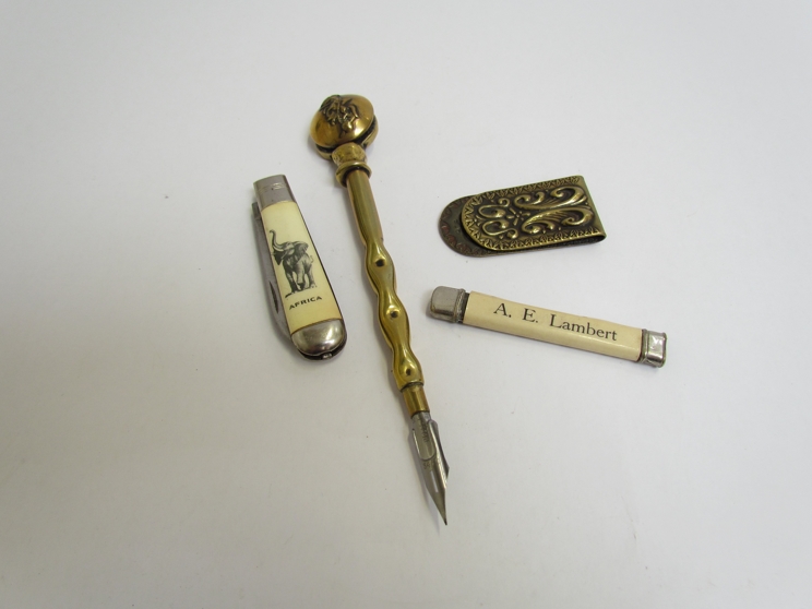 Curiosities including brass quill pen, penknife,