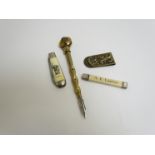 Curiosities including brass quill pen, penknife,