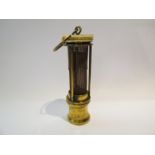 A Davy lamp (all brass) stamped "Davis,